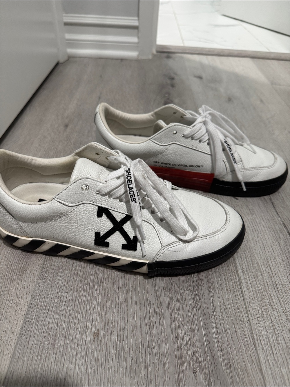 Off-White White Leather Low-Top Sneakers with Black Arrow Logo and Red Accent
